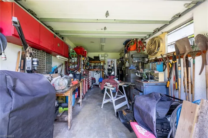 Garage featuring a workshop area