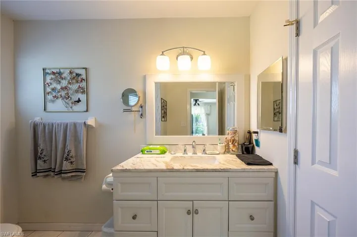 Bathroom with vanity and toilet