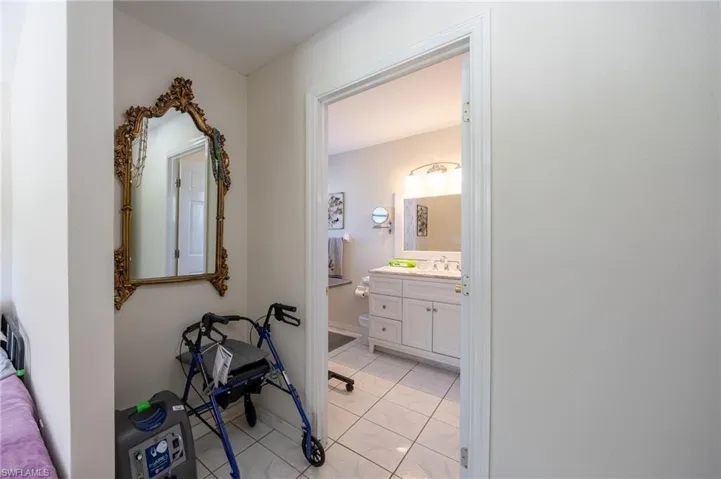 Bathroom with vanity and tile patterned flooring