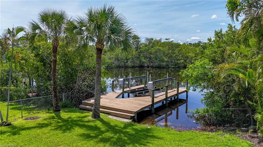 Dock featuring a water view