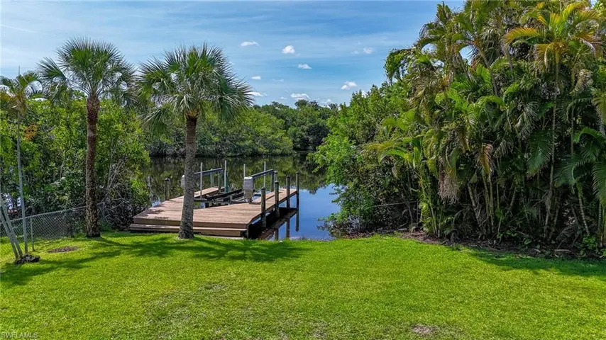 Dock featuring a water view