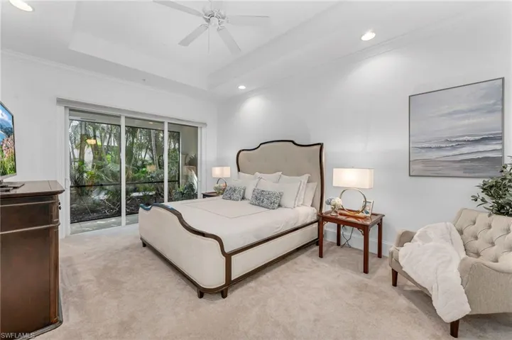 Spacious Primary Suite with sitting area is the perfect place to unwind.