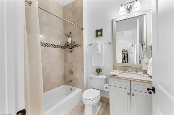 he primary bath has large, walk-in shower with frameless doors, a double vanity, and large linen closet.  Care for a bubble bath after a long day?