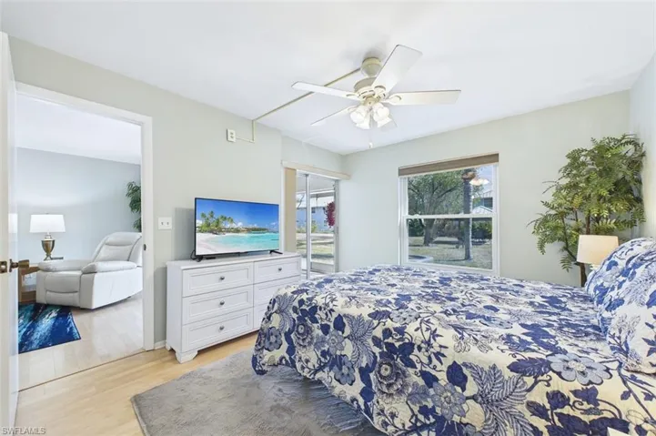 Bedroom featuring light wood-style flooring and a ceiling fan