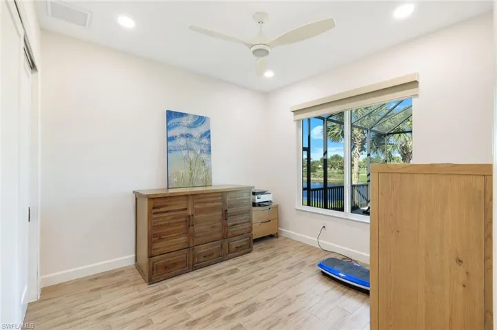 Bedroom featuring Guest bedroom with recessed lighting, ceiling fan, and light wood-type flooring