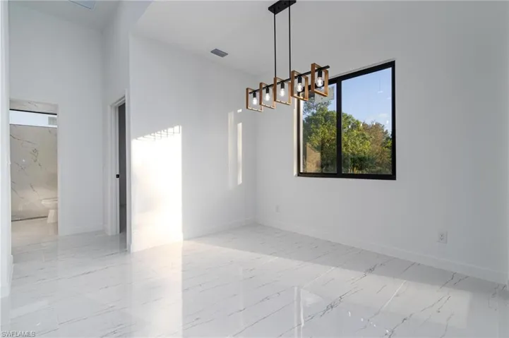 Dining area featuring a chandelier