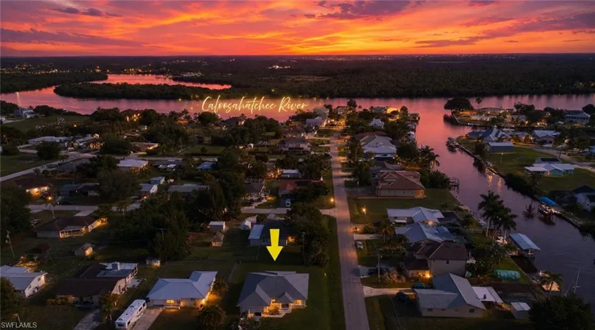 Aerial perspective showcasing the residential area with the Caloosahatchee River in the background