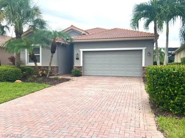 View of front of home featuring a garage