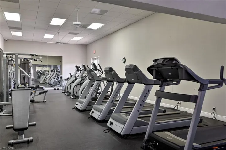 Gym featuring a paneled ceiling