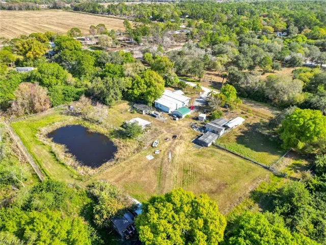 Aerial view of property's location featuring a nearby body of water