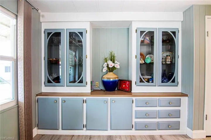 Detailed view of wood finished floors and baseboards