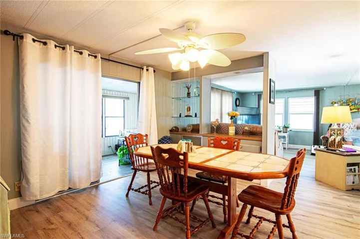 Dining room featuring light wood-style floors and a ceiling fan