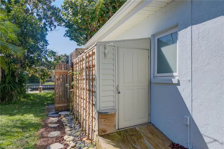 ATTACHED SHED FOR STORAGE ON LEFT SIDE OF HOME