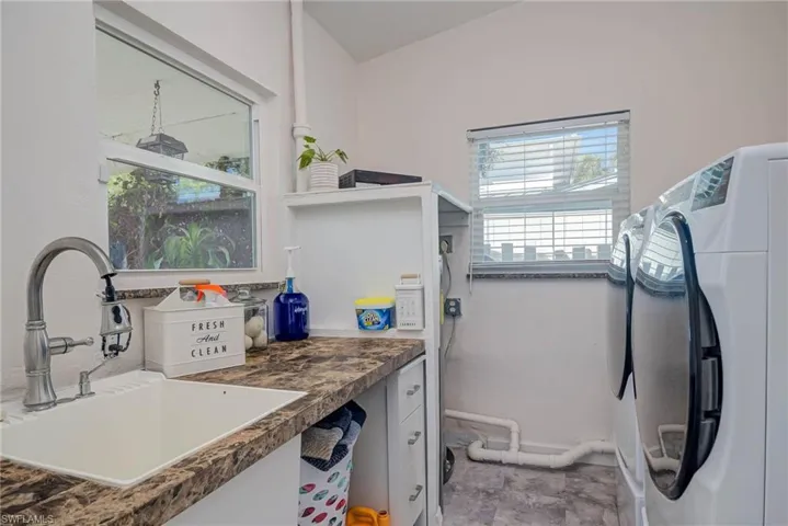 LOCATED OFF OF KITCHEN.  BARN DOOR OPENS THIS ROOM UP.