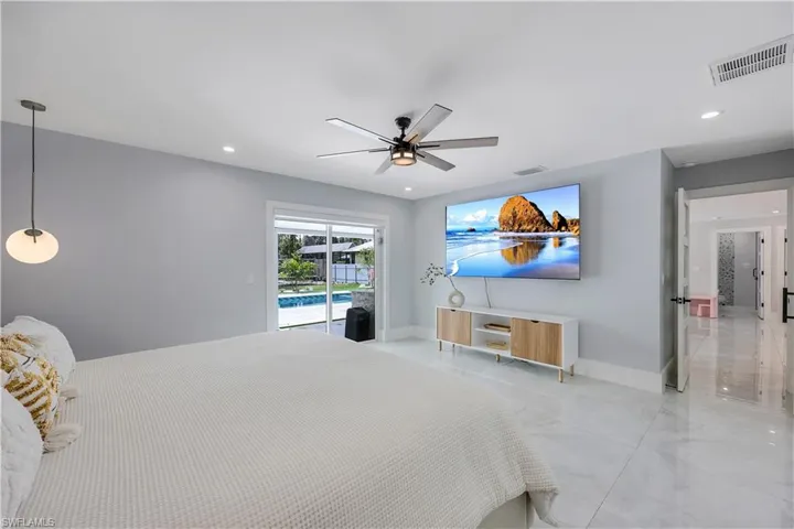 Bedroom featuring access to outside, ceiling fan, and recessed lighting