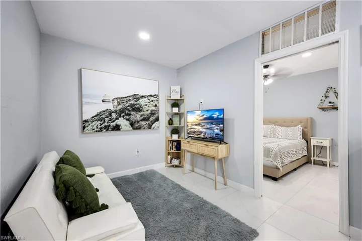 Sitting room featuring baseboards