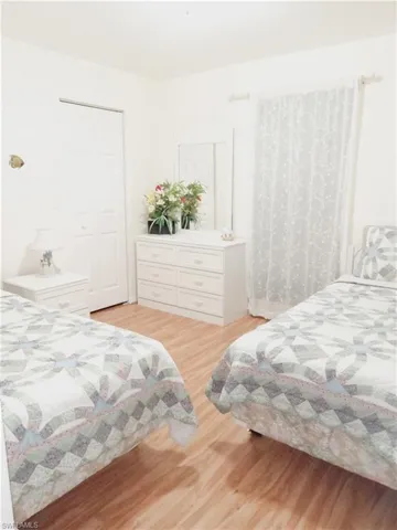 Bedroom with light wood-type flooring