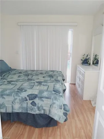 Bedroom with light wood finished floors