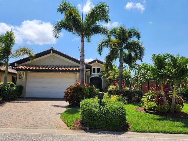 View of front of property with a garage