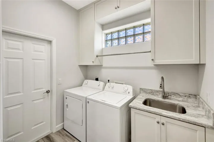 Laundry Room with New 2023 Washer, Dryer and New Custom Cabinetry