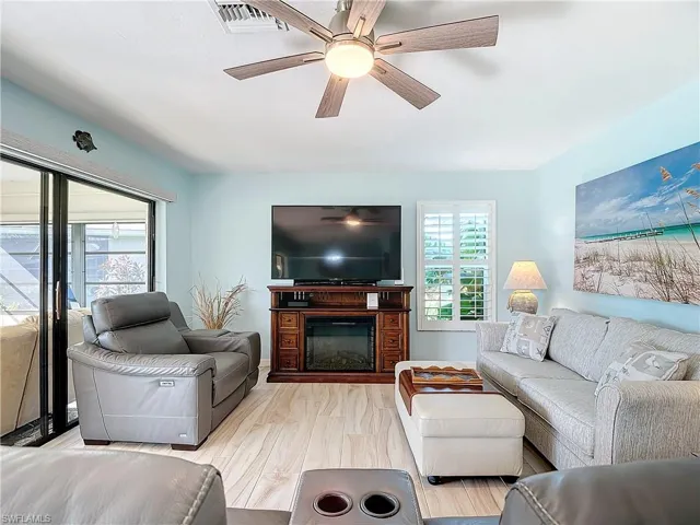 Modern ceiling fans, porcelain tile throughout.