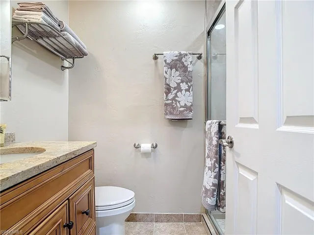 Guest bath with updated walk-in shower.