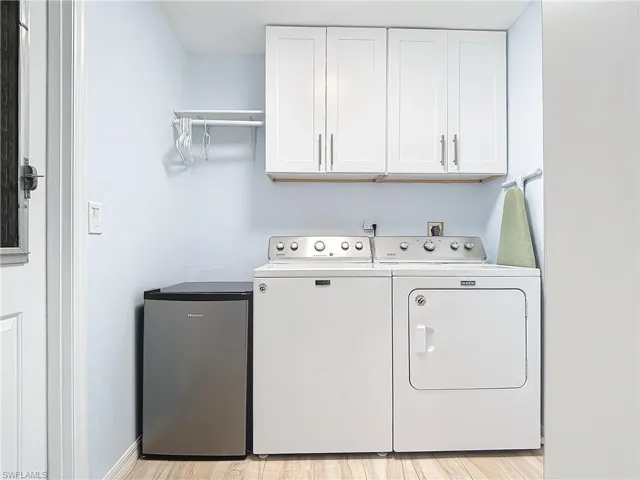 Additional storage in the laundry room. Beverage Fridge does not convey.