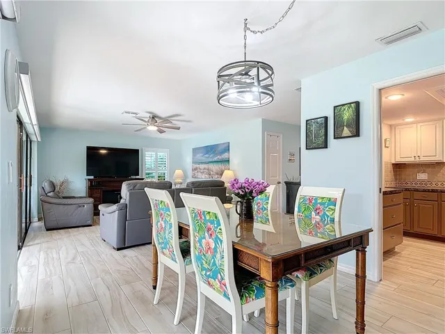 Dining room is just off the kitchen and opens to the living area.