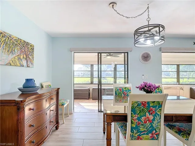 Dining space with updated lighting.