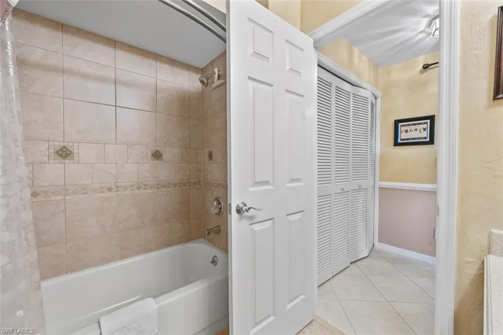 Guest bathroom with tub/shower combo.