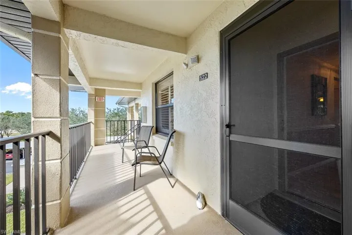 Screened in entry to front door.