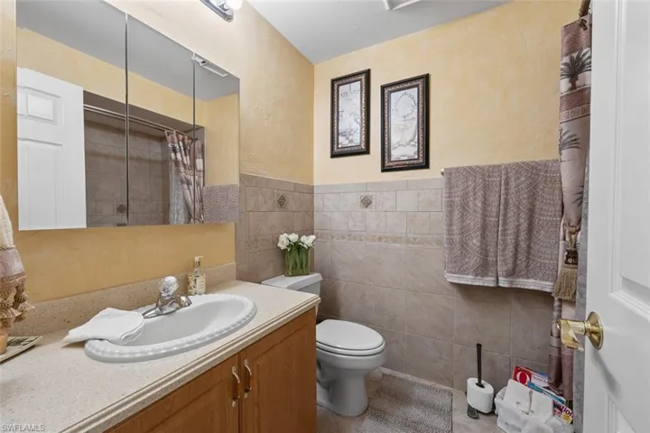 Guest bathroom with shower/tub combo.