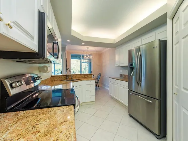 Granite counters and stainless steel appliances.
