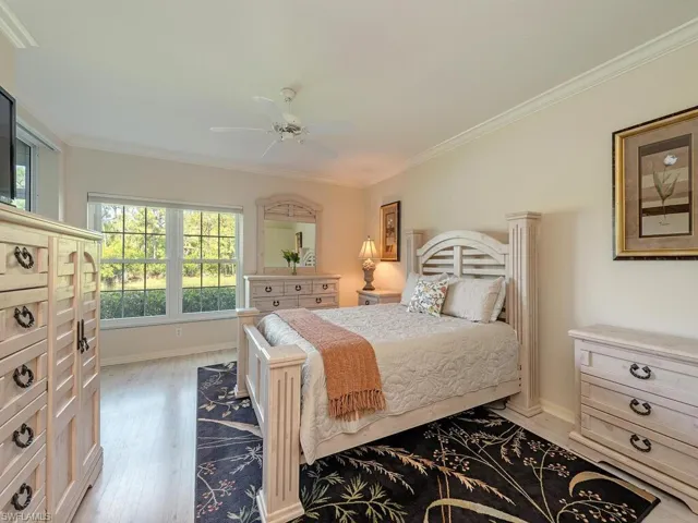 Room darkening shades, two closets, lake/preserve views with direct access to the enclosed lanai area.