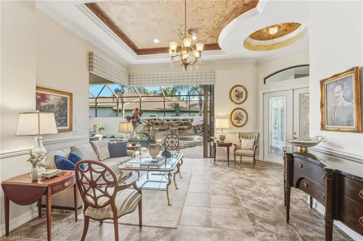 Living Room with view to pool and front door