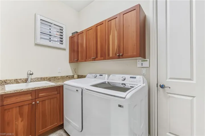 Laundry with storage utility sink