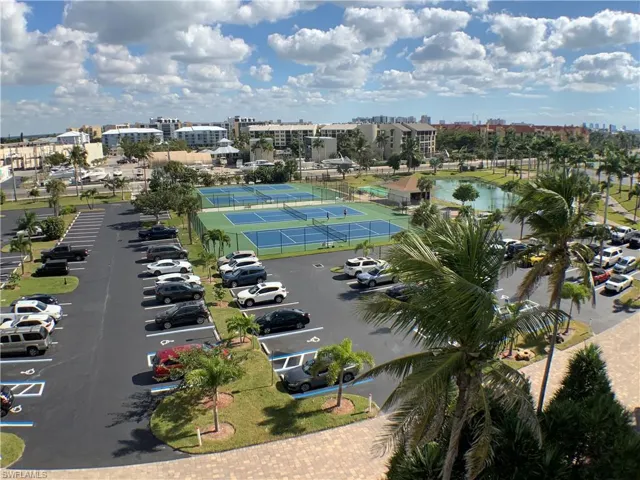 Pond with fountain, pickle ball and tennis courts shuffle board and bocce ball