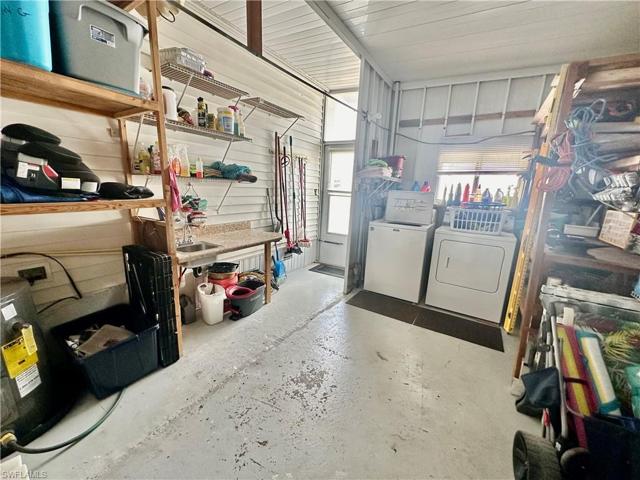 Large Utility Shed w/Washer & Dryer, Utility Sink and Lots of Shelfs for storage