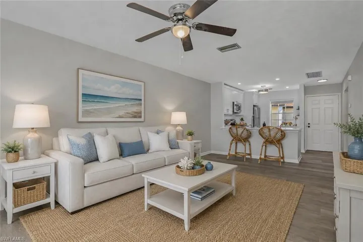 Re-Imagined Living Room Space - This room decor can easily be recreated to give you the coastal look you are searching for!