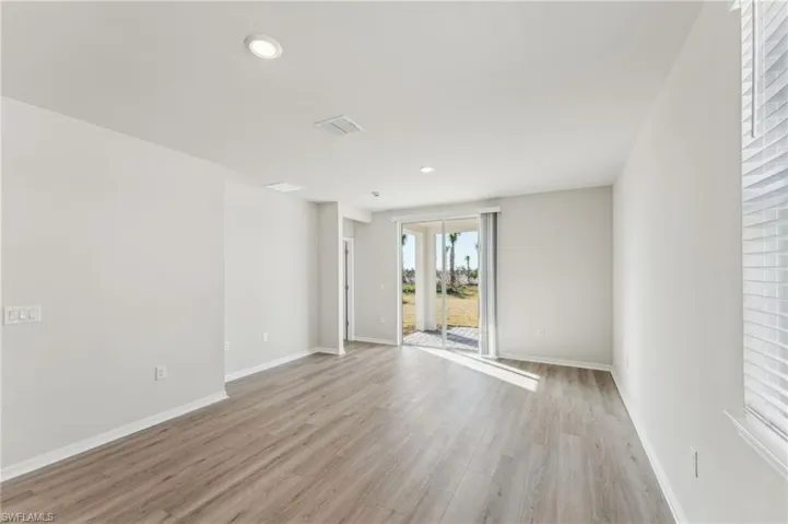 Empty room featuring light hardwood / wood-style flooring
