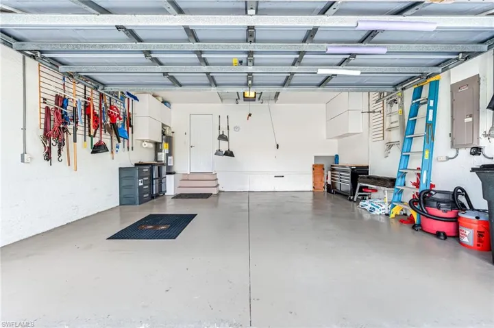 Garage featuring electric panel