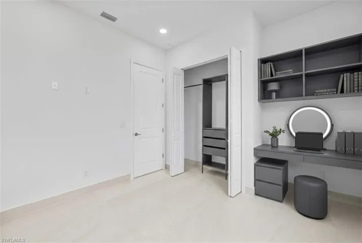 Home office featuring baseboards and recessed lighting