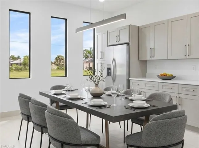 Dining space featuring baseboards and recessed lighting
