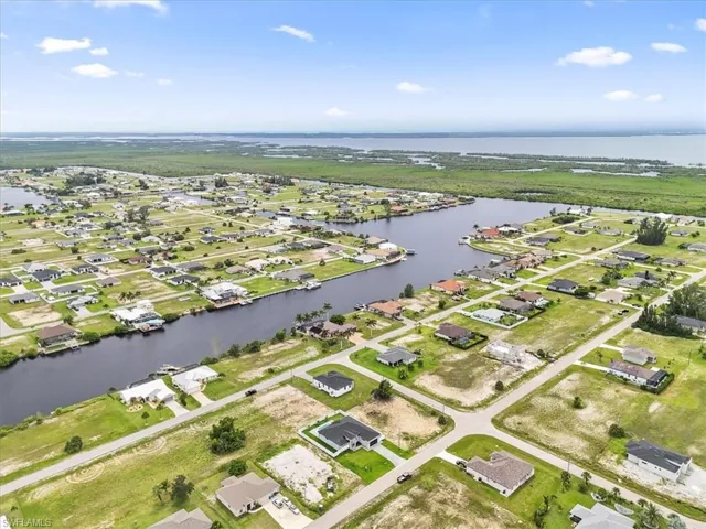 Aerial view of residential area with a large body of water