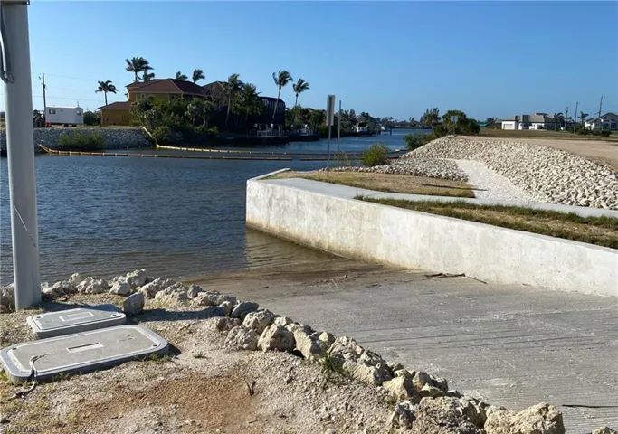 Water view with a boat ramp