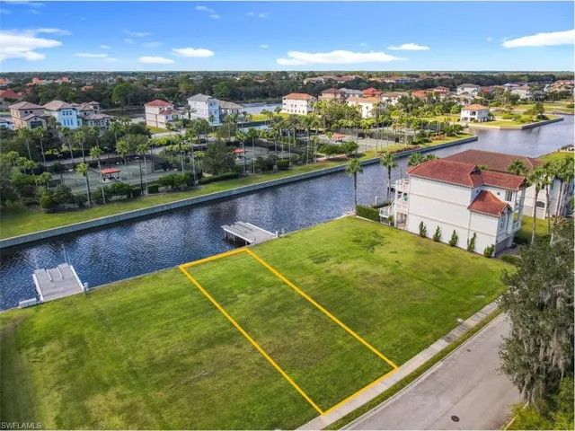 Aerial view of residential area with a large body of water