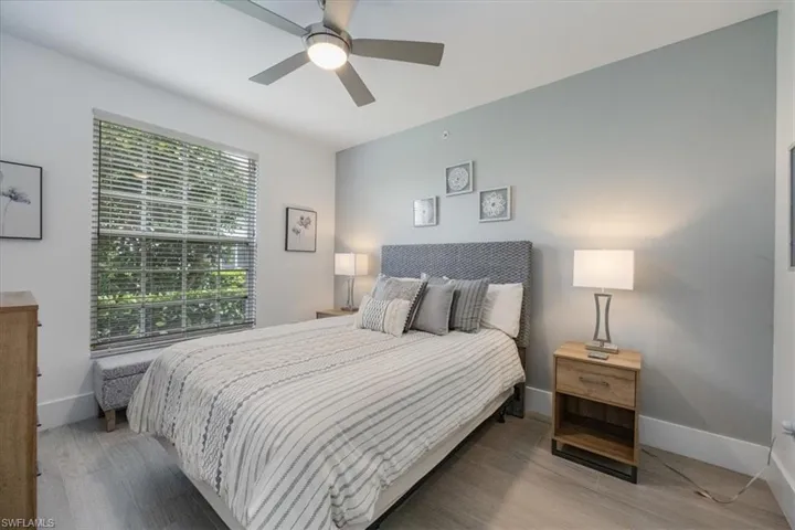 Bedroom featuring ceiling fan and wood finished floors