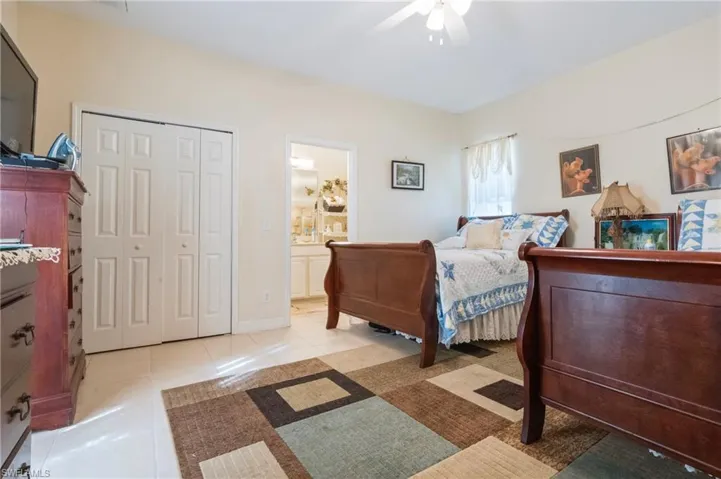 2nd Master Suite with walk-in closet and door to the pool.