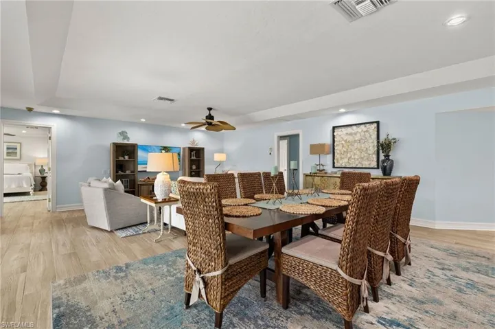 Dining room with recessed lighting, light wood-type flooring, and ceiling fan