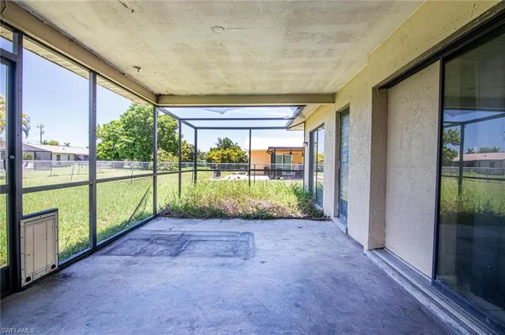 Unfurnished sunroom with a wealth of natural light